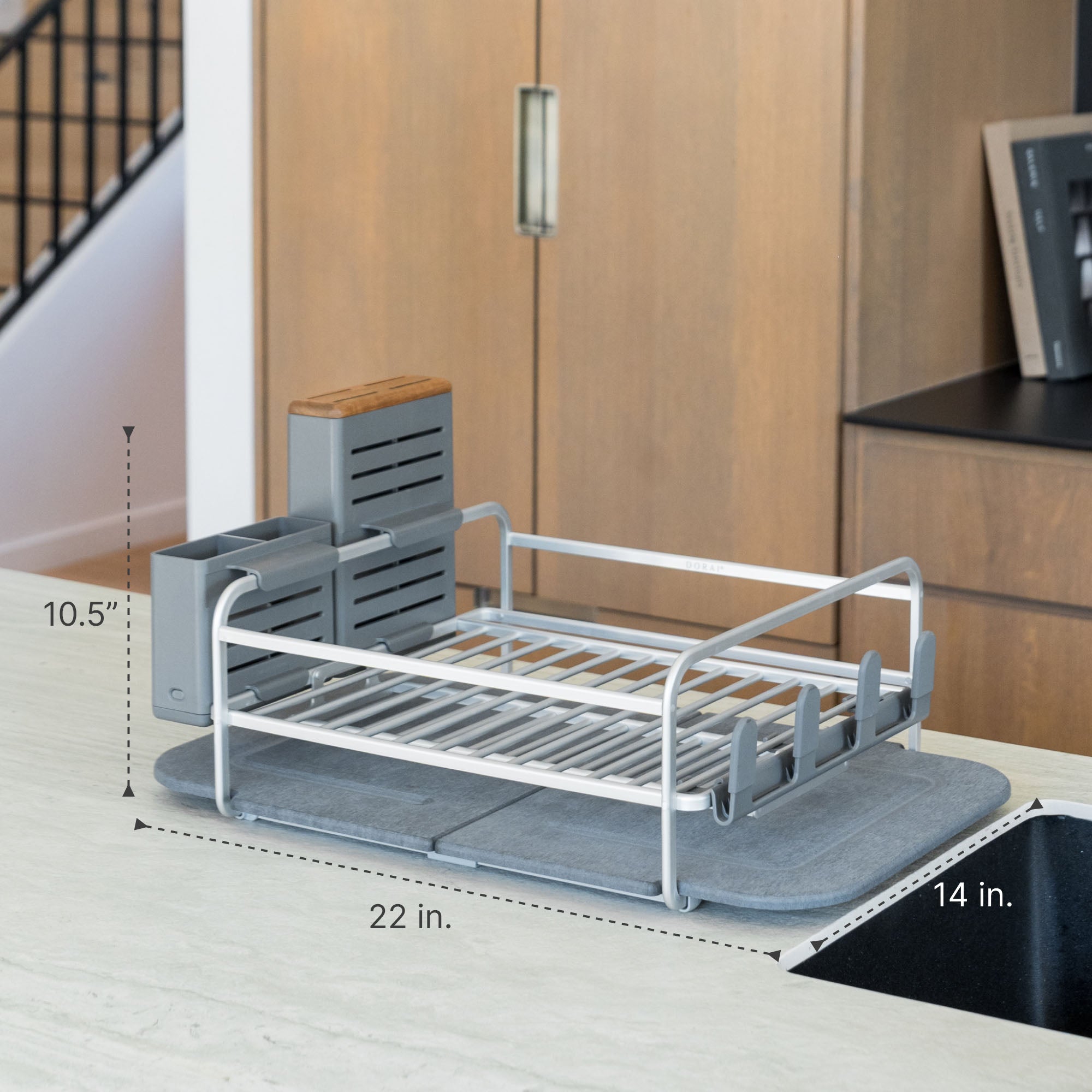 Dimensions of Slate dish rack in modern kitchen: 10.5x22x14 inches.