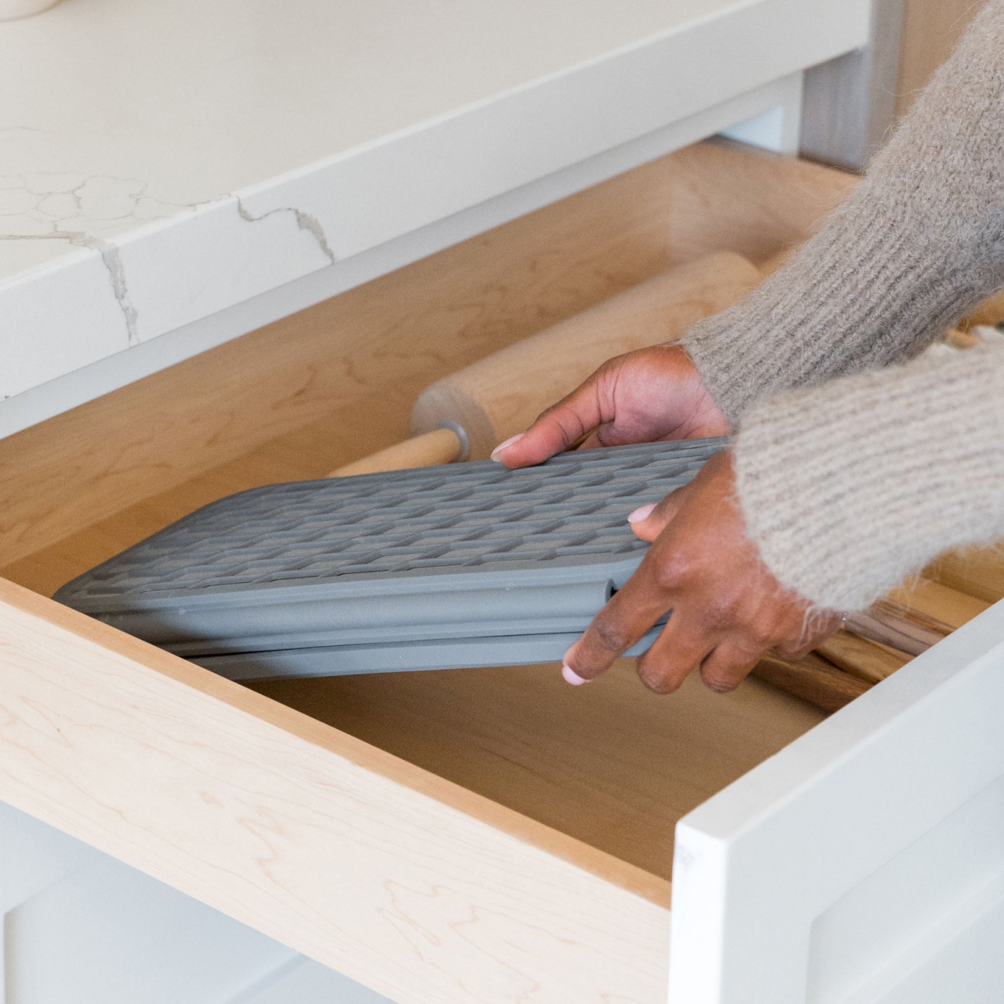Drift Slate Dish Pad folds neatly in drawer when not in use. 