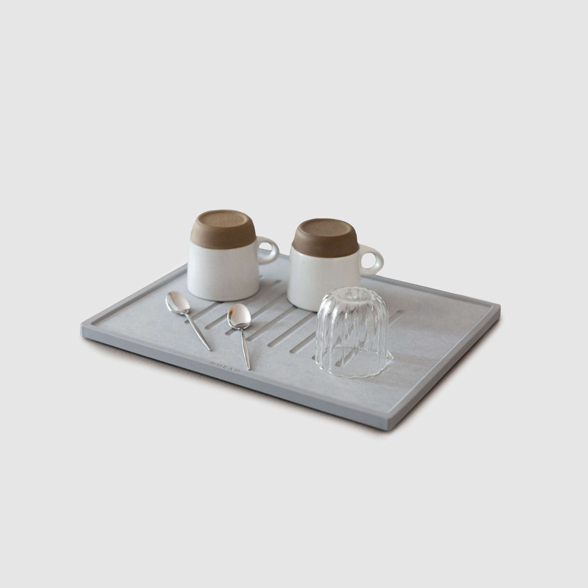 Ash dish drying stone with dishes. 