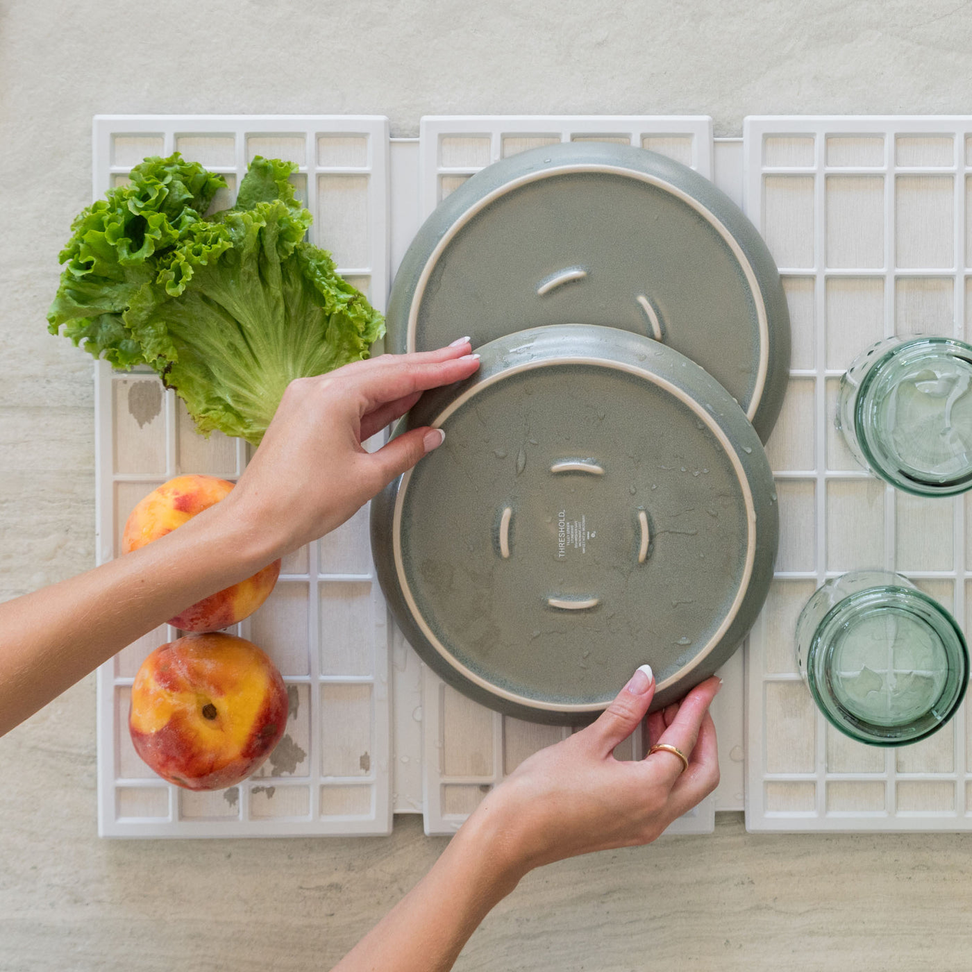 Glacier Ridge Dish Pad with plates and produce is quick-drying.