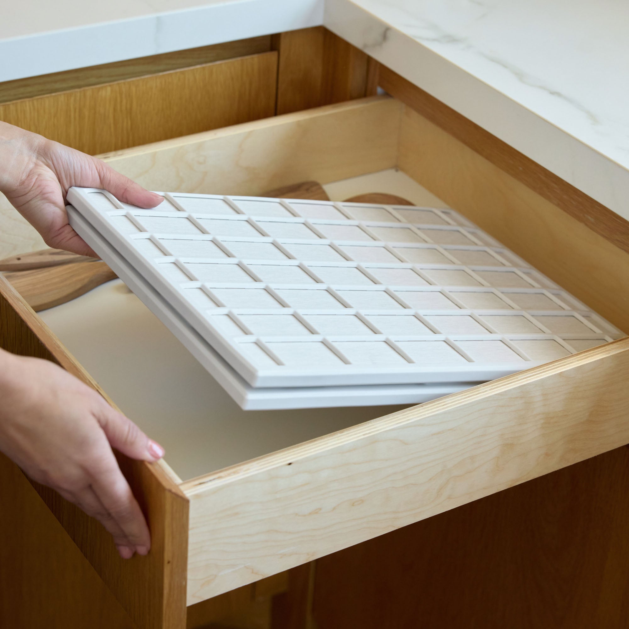 Glacier Ridge Large Dish Pad folded in half tucks neatly in kitchen drawer.