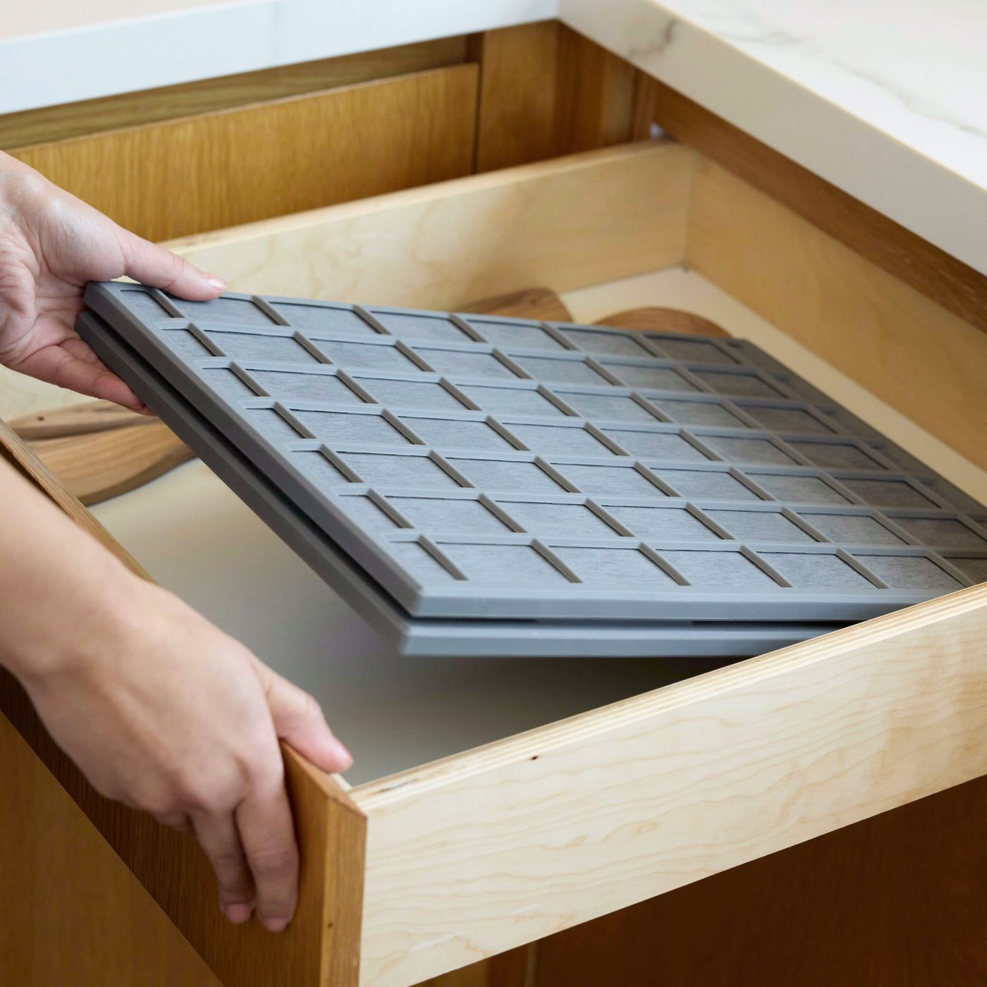 Slate Ridge Large Dish Pad folded in half tucks neatly in kitchen drawer.