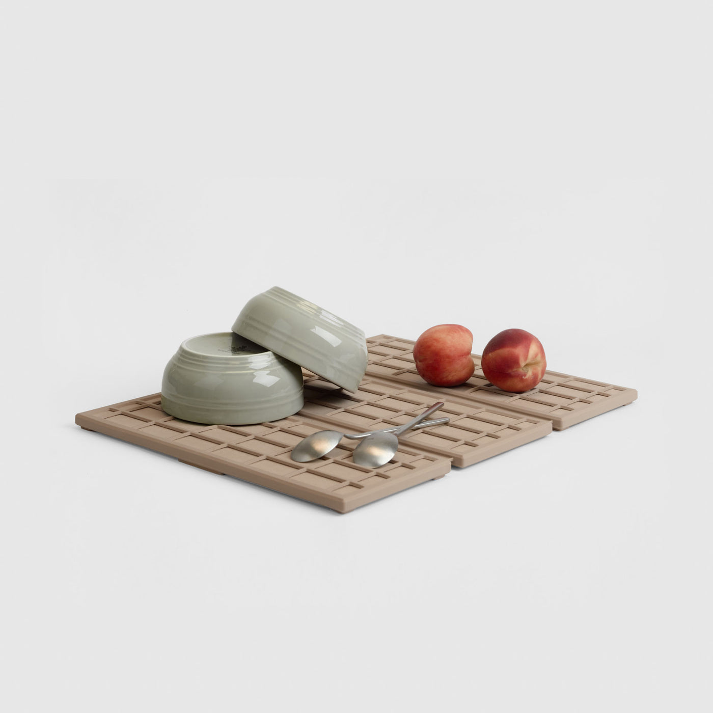 Clay Ridge Dish Pad on white background with dishes and produce. | Pre-Order Clay