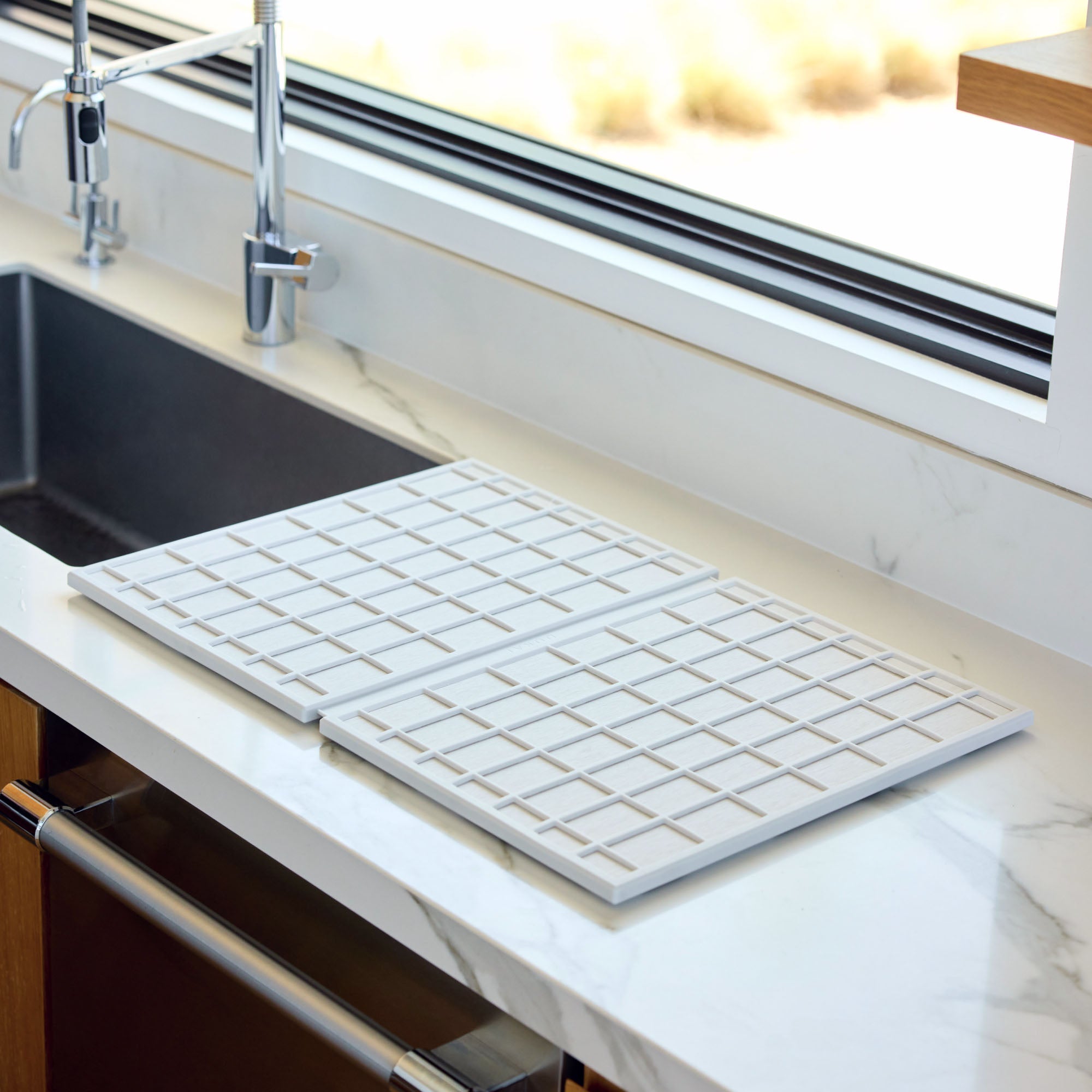 Ridge Large Dish Pad in Sandstone in beautiful kitchen.