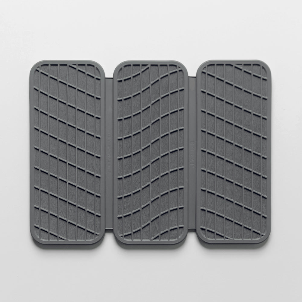 dark grey dish pad with silicone cover