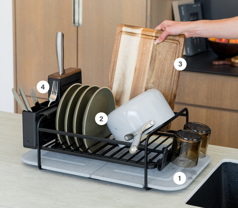 Large dish rack fully loaded with dish rack. 