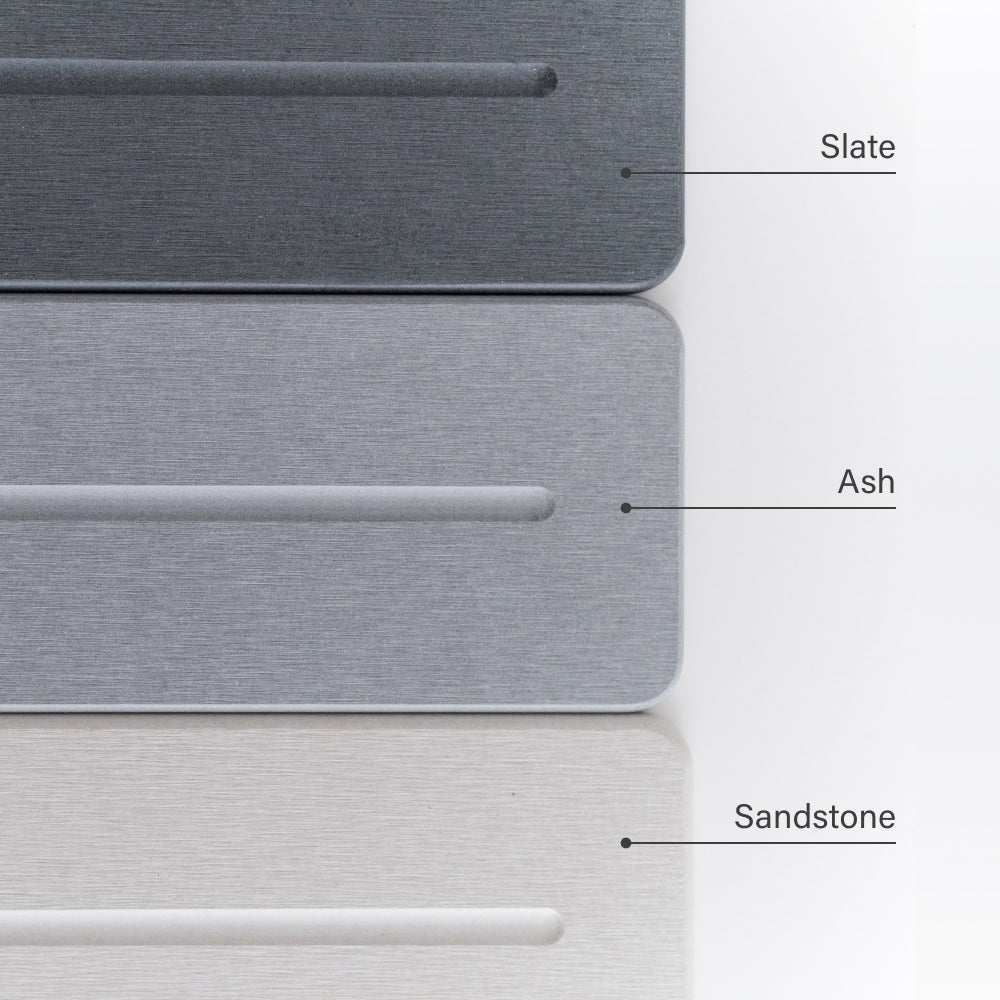 Three different stone sink caddied labeled 'Slate', 'Ash', and 'Sandstone' on a white background.