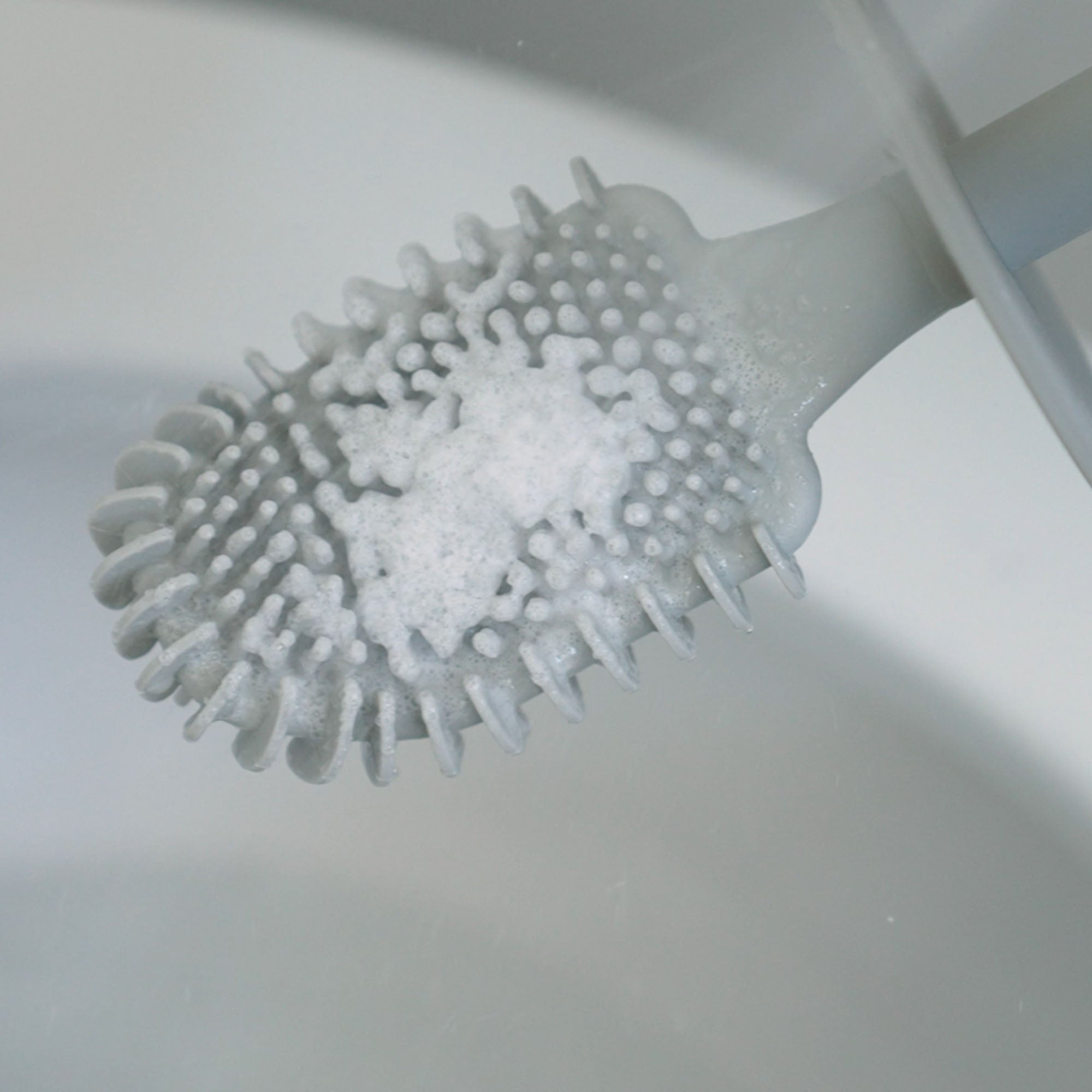 The toilet brush head can be cleaned with any bathroom cleaner