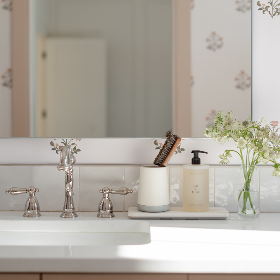 bathroom sink with sandstone brush holder