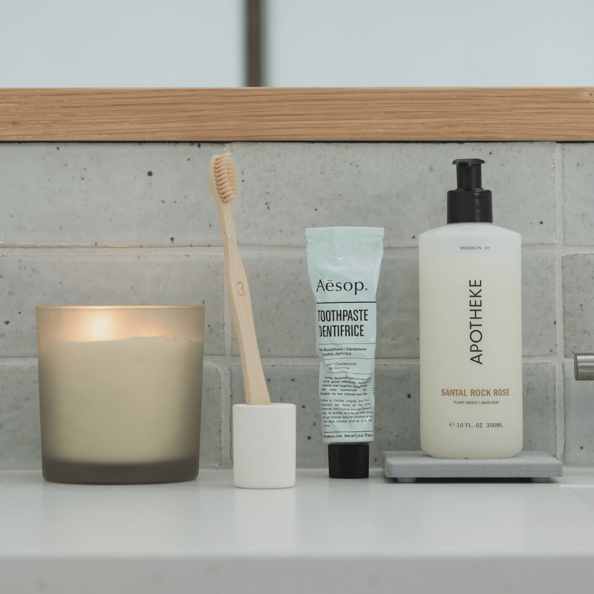 Versatile Soft Beige Small Toothbrush Holder in bathroom with Soap Caddy holds razor, toothbrush, electric toothbrush, brushes, or matches. 
