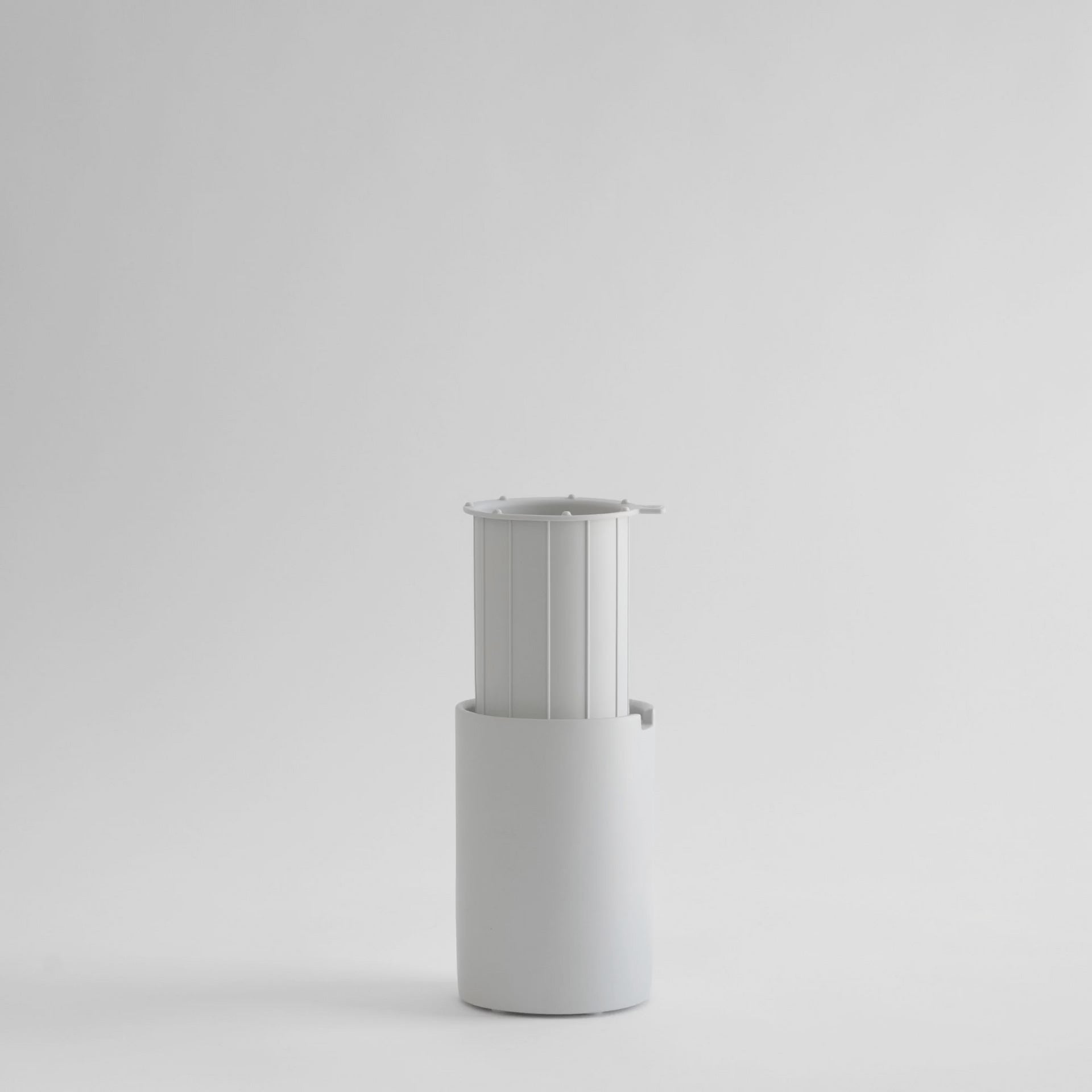 Modern, clean toilet brush holder. 