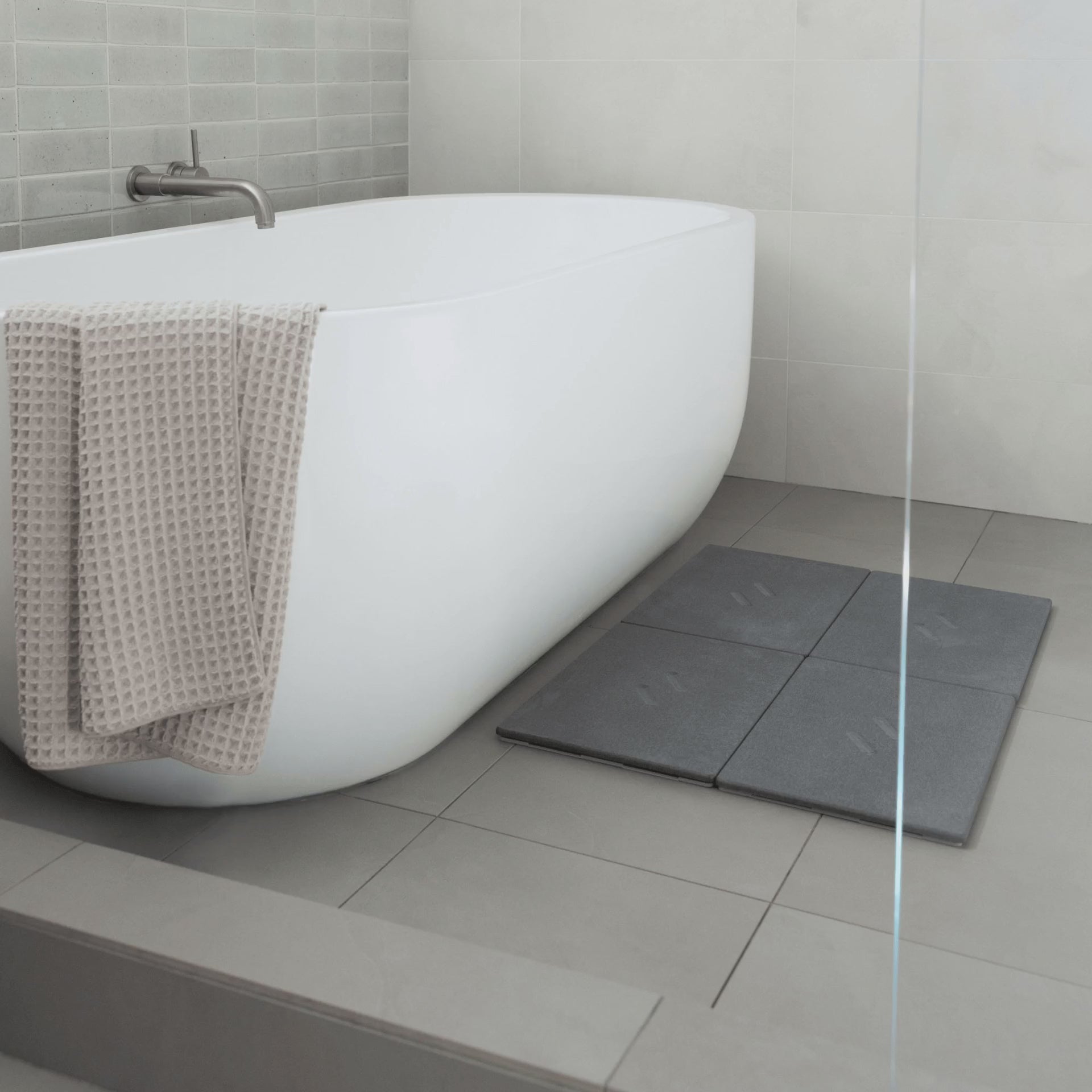 Large Alta bath stone in Slate with customizable layout. 