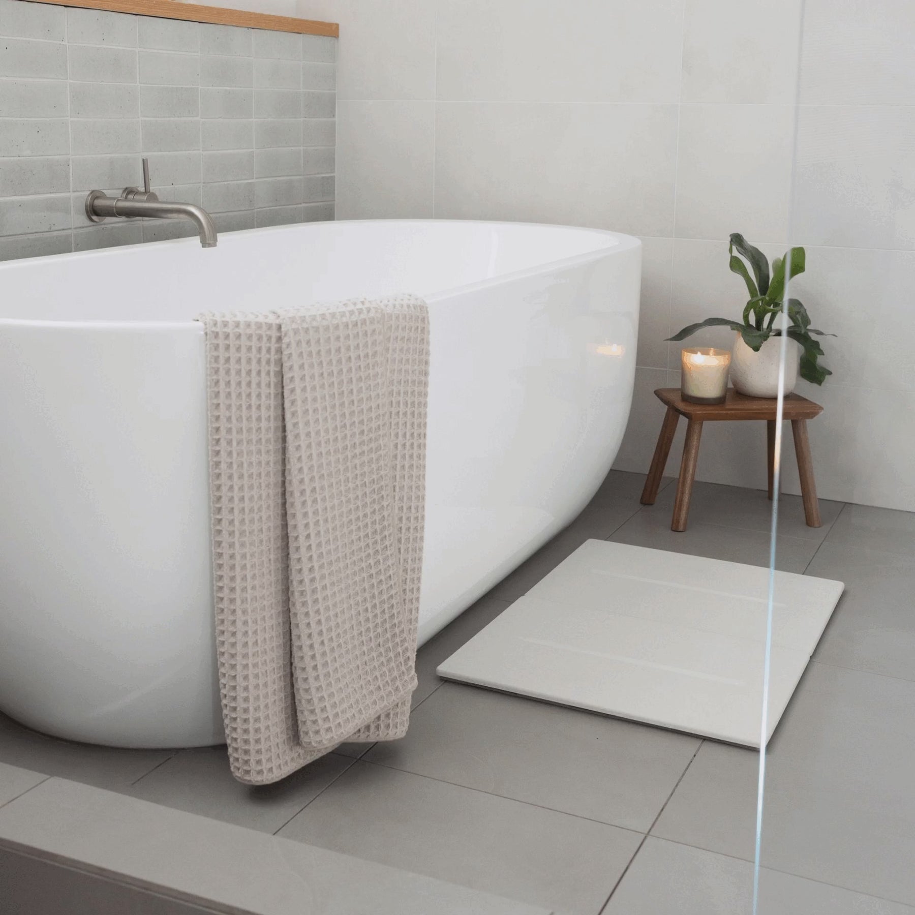 Image showcasing Medium Bath Stone™ Mildew & Mold Resistant Bath Mat | Dorai Home