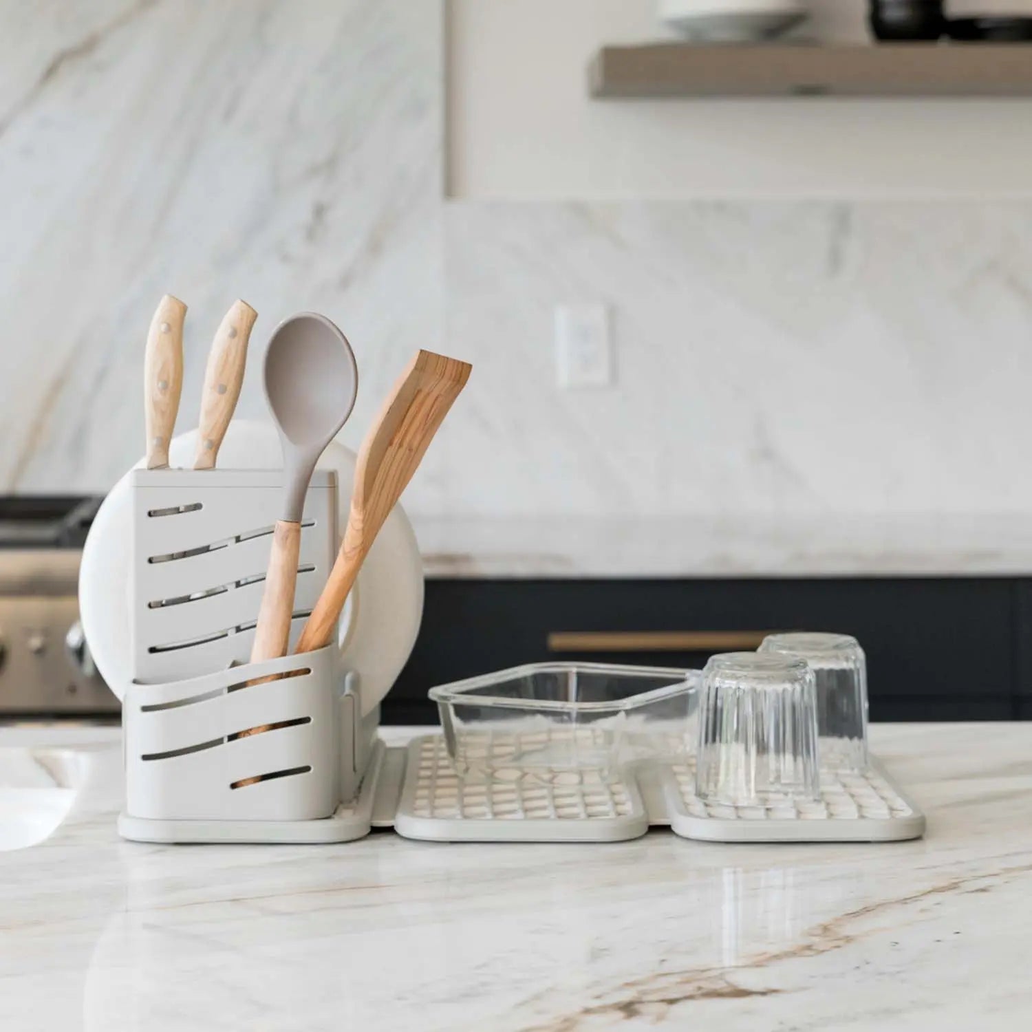 sandstone dish pad rack with utensils and dishes