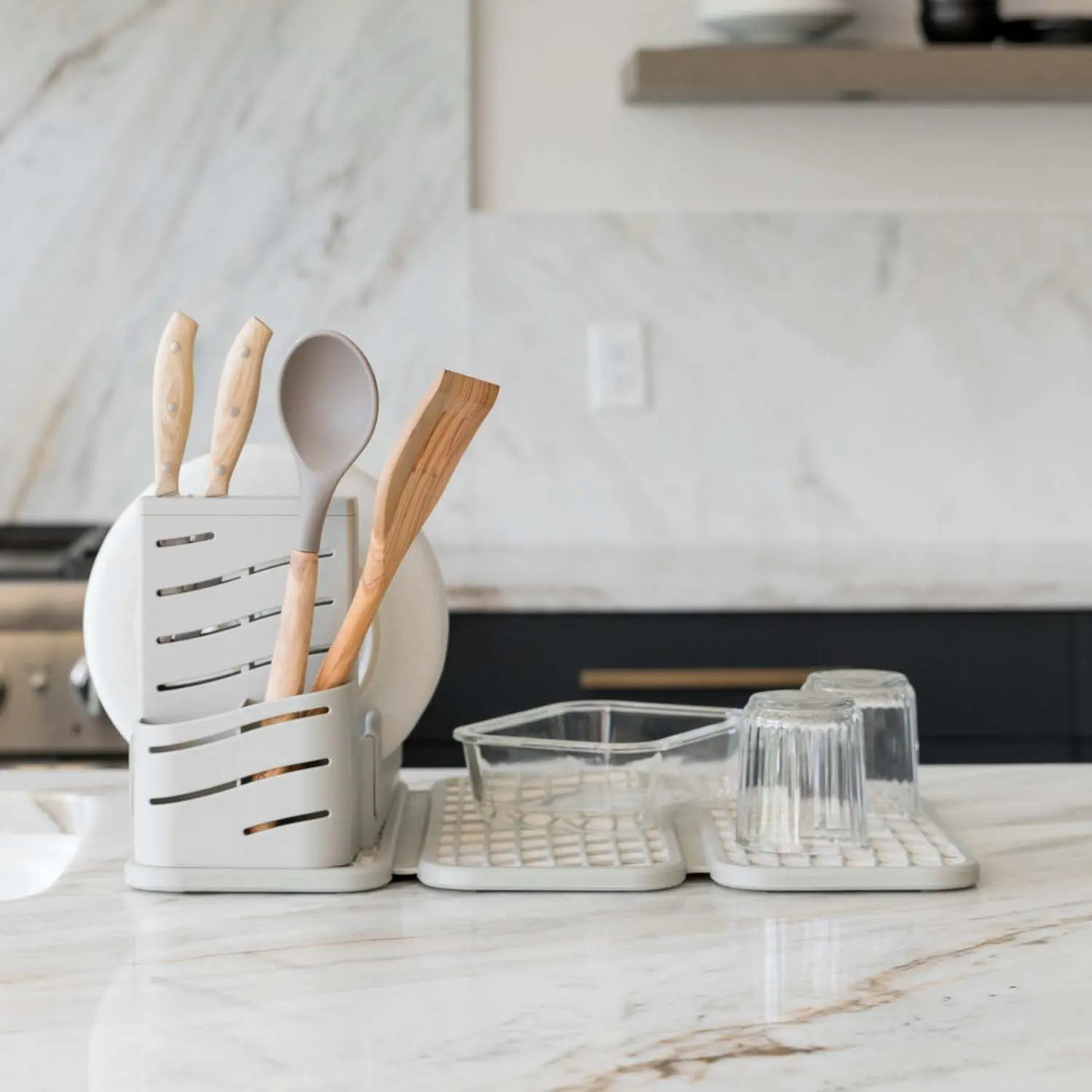 sandstone dish pad rack with utensils and dishes