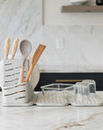 sandstone dish pad rack with utensils and dishes