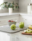 sandstone dish pad with fruit in kitchen