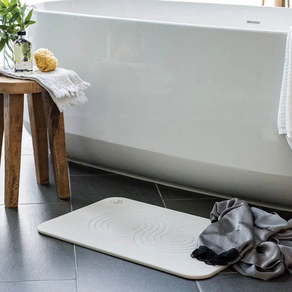 Sandstone Bath Stone™ in front of bath tub