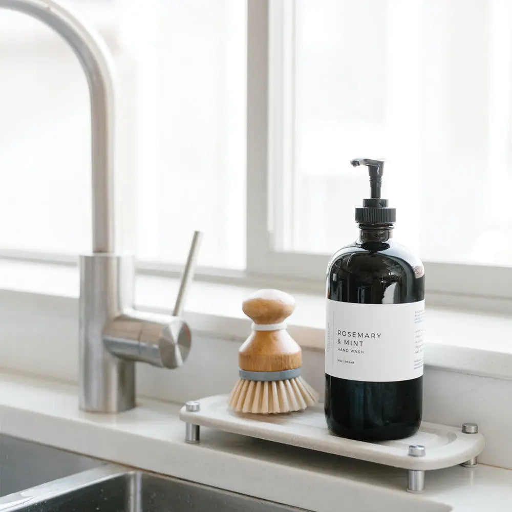 Dorai Sink Caddy in kitchen with soap and brush